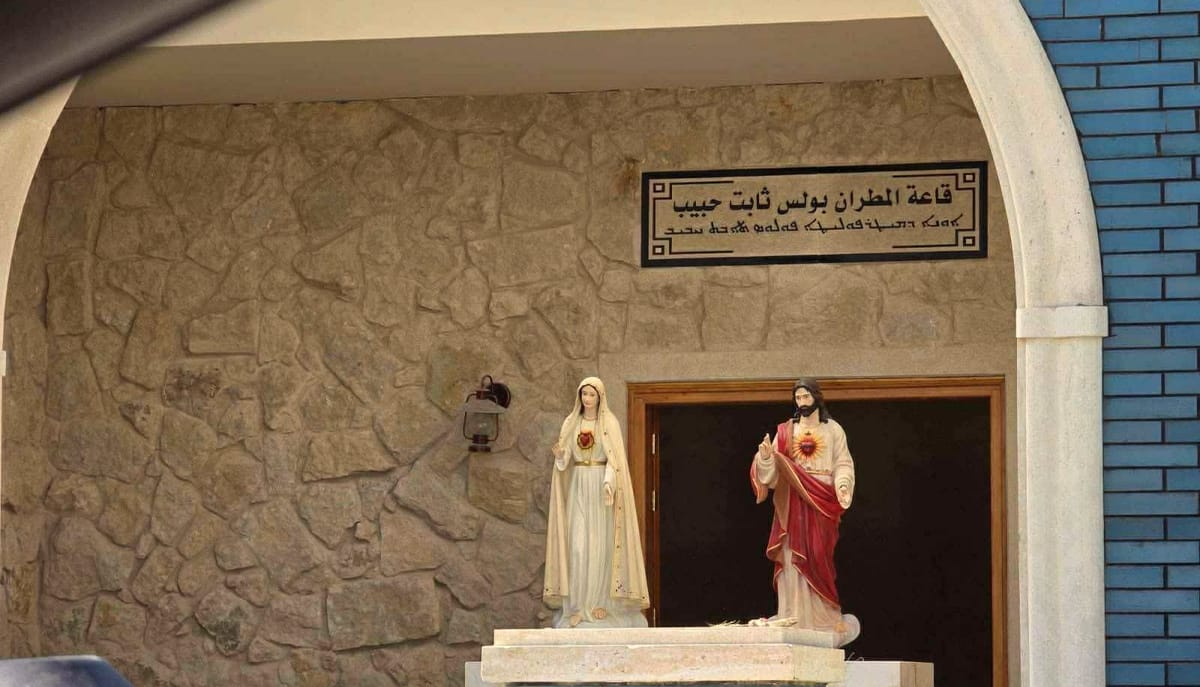 Heated debate as patriarch forces removal of memorial to beloved bishop in Alqosh